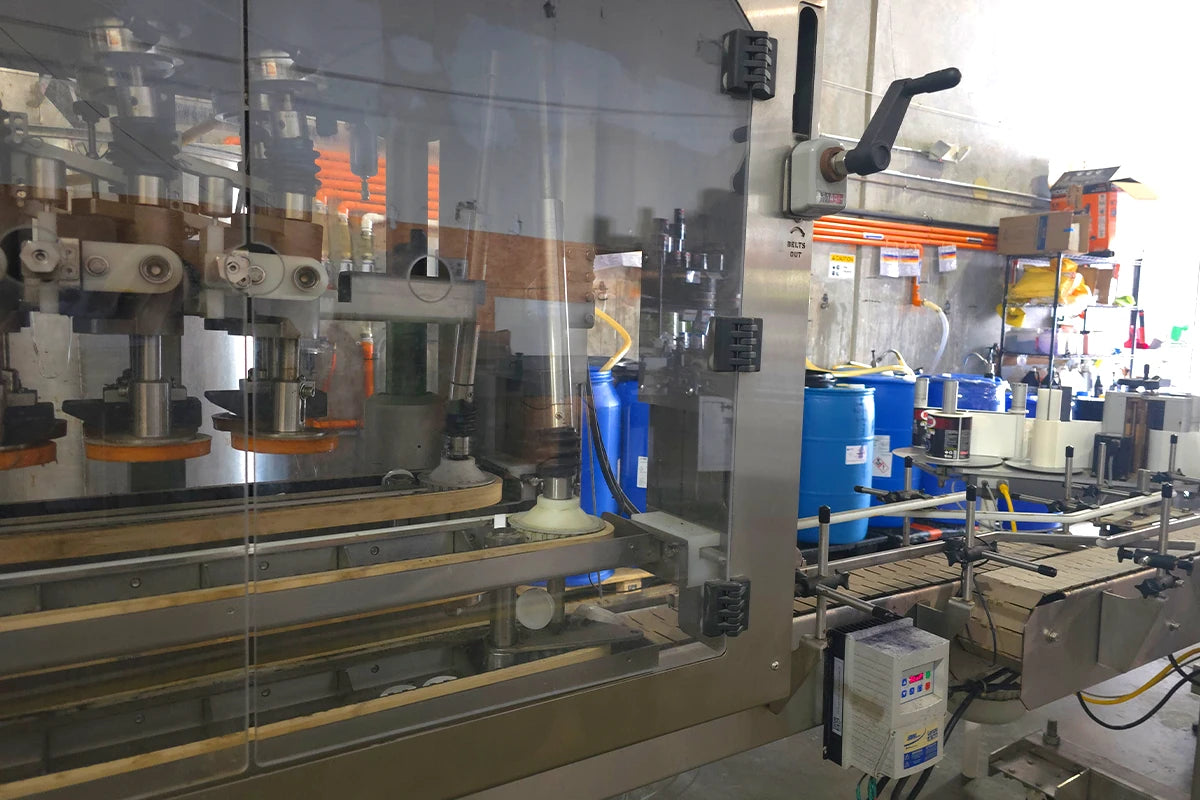 Industrial machine in a factory setting with various components and equipment.