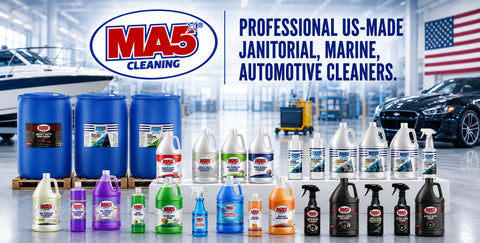 A promotional product lineup for MA5X, showing many janitorial, marine, and automotive cleaner bottles and containers arranged in front of 55-Gallon Drums, with a boat interior, American flag, and car in the background.